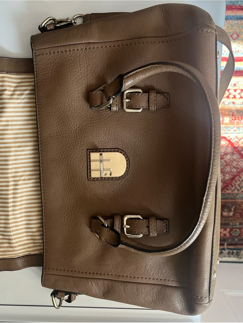 Kate Spade New York brown purse with handles strap buckle